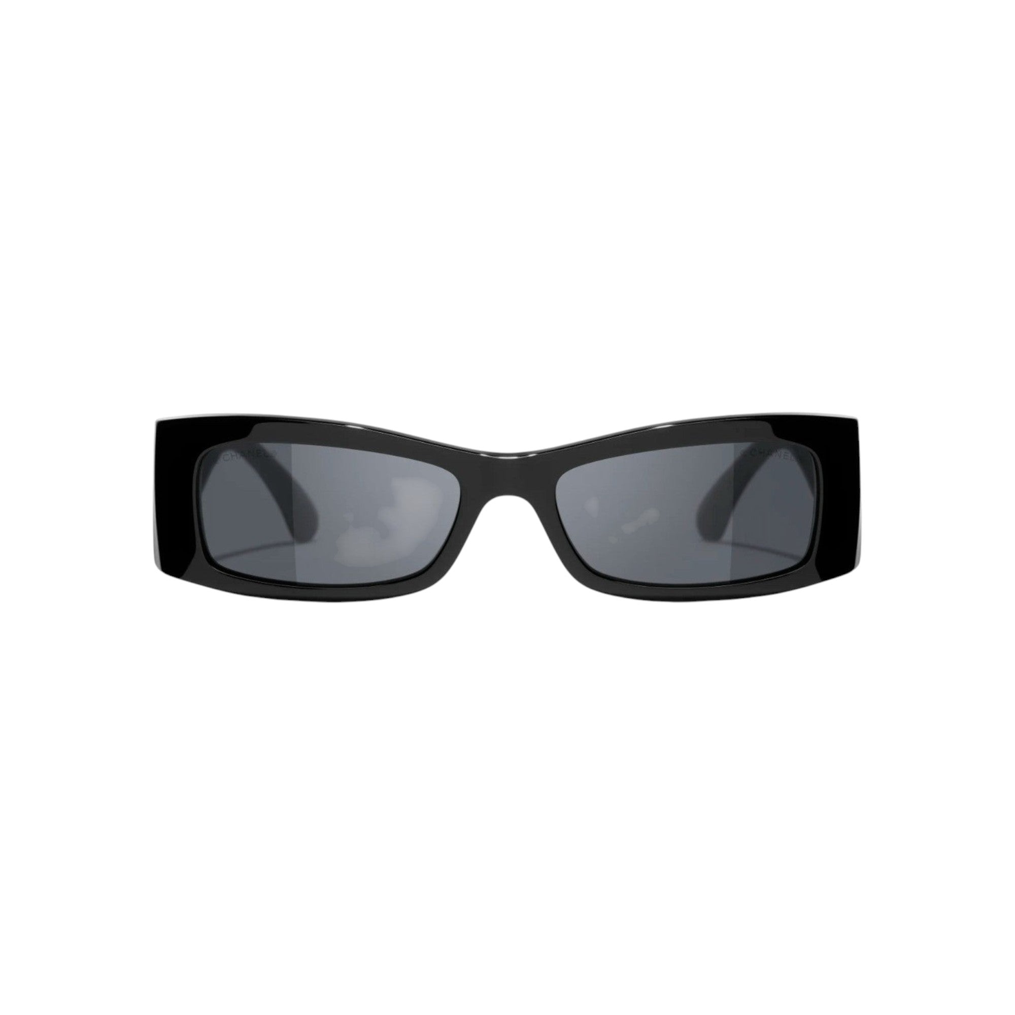 Via Manzoni Boutique black acetate rectangular sunglasses with lattice detail and grey gradient lenses.