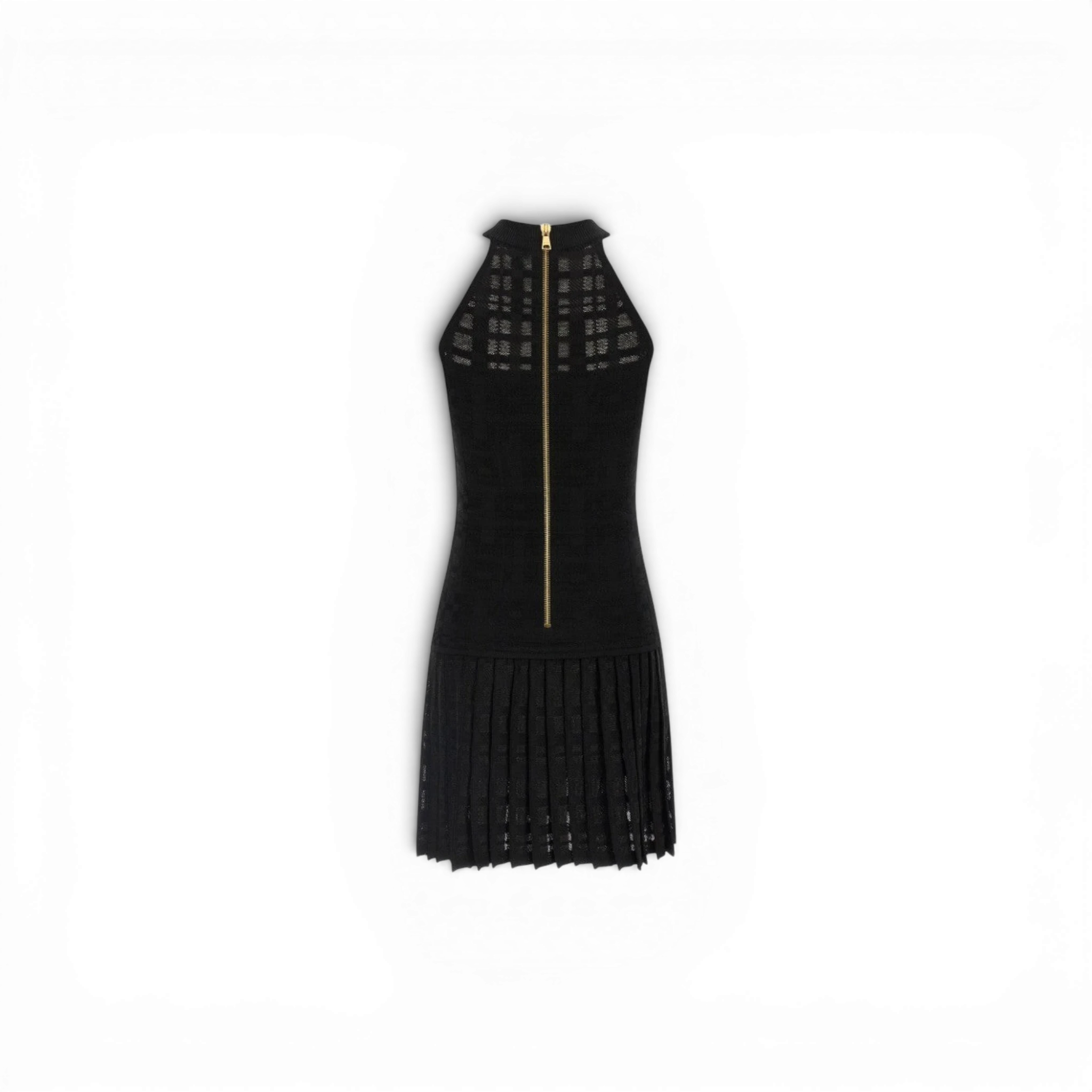 Via Manzoni Boutique black sleeveless knit dress with halter neck, grid pattern yoke, gold buttons, and pleated skirt.