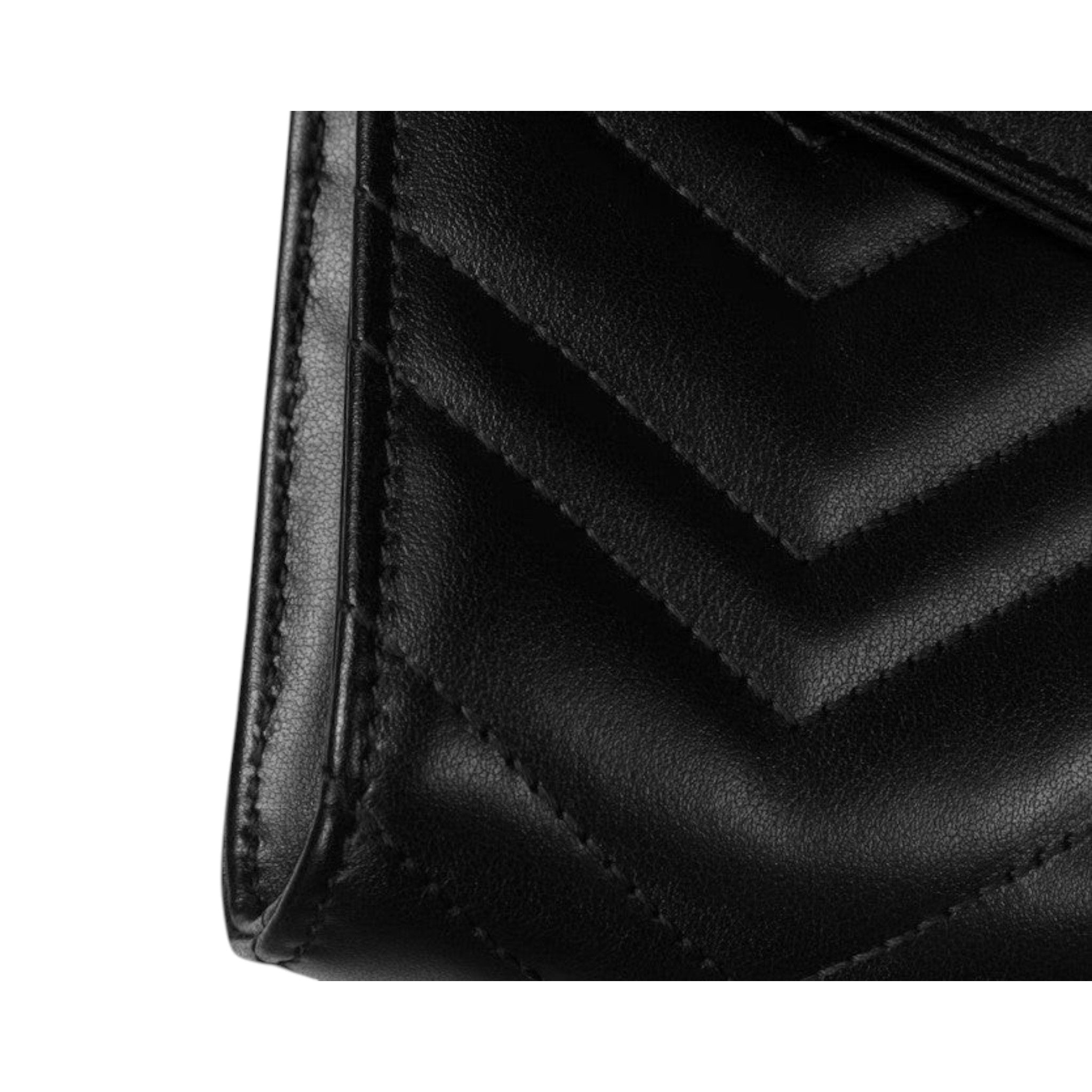 Via Manzoni Boutique black quilted leather wallet on a chain with chevron pattern and gold-toned double G logo.