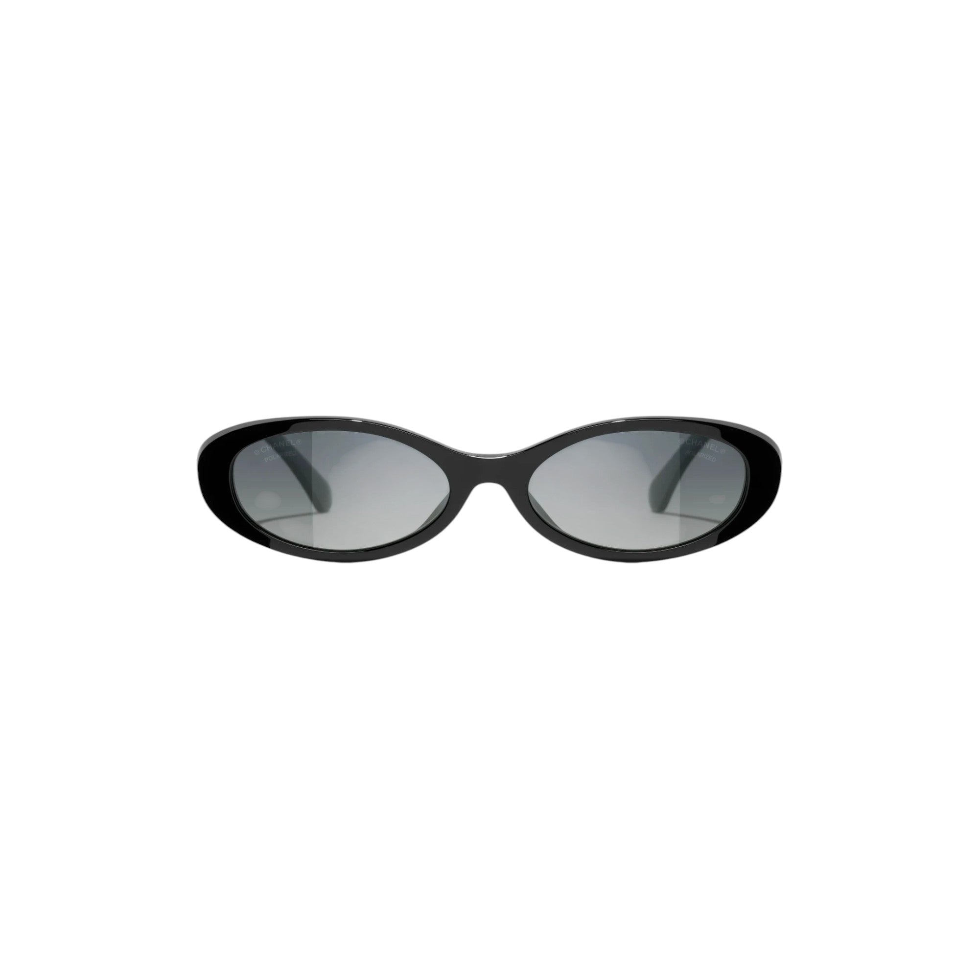 Via Manzoni Boutique Chanel black acetate oval sunglasses with dark gray lenses and signature metal temples.
