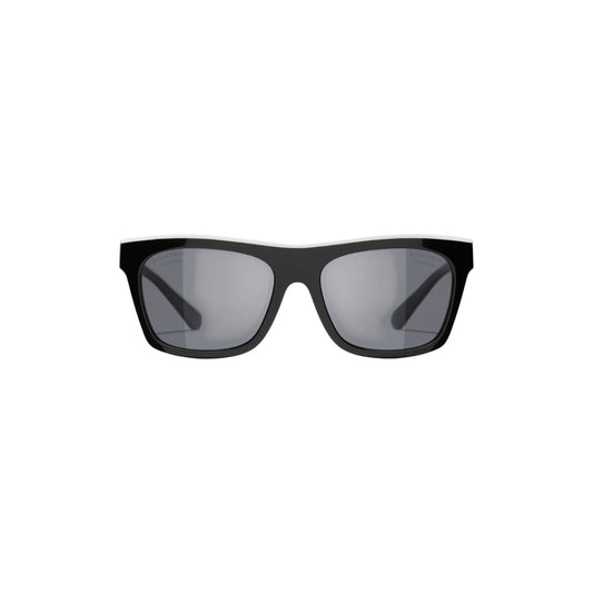 Via Manzoni Boutique Chanel black acetate rectangular sunglasses with white top rim and grey polarized lenses.