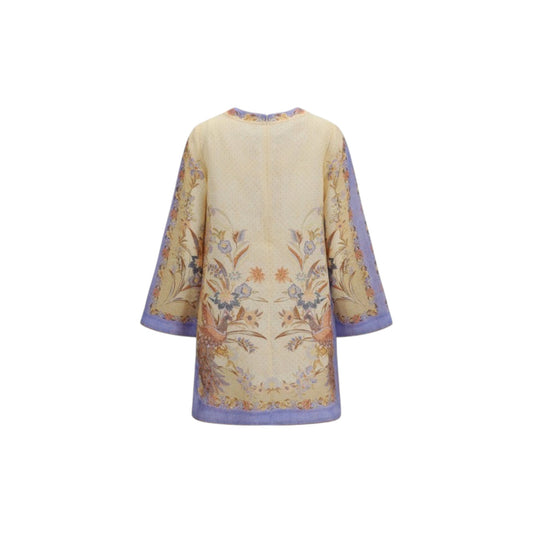 Via Manzoni Boutique floral tunic dress with peacock motifs, lavender accents, and three-quarter sleeves, back view.