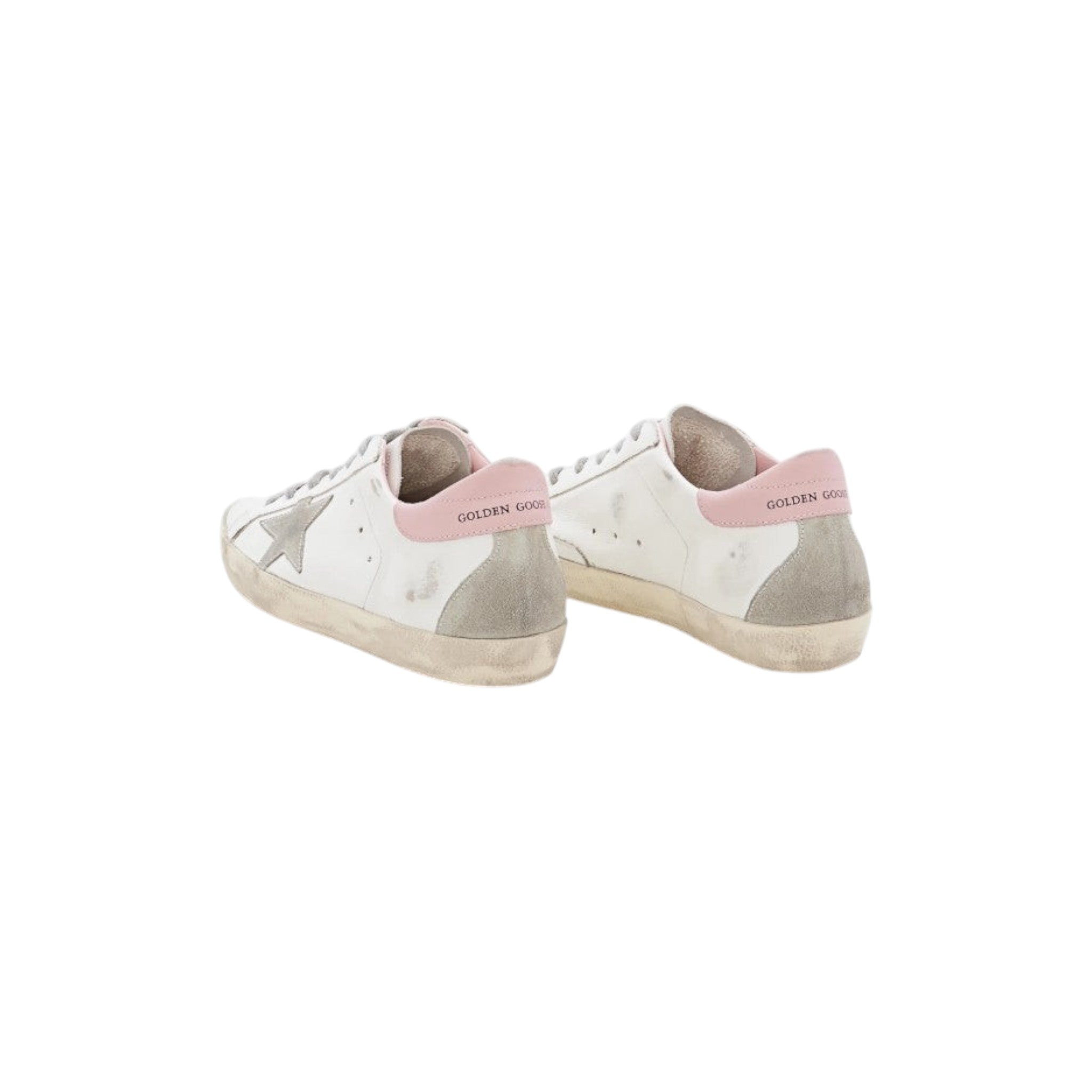 Via Manzoni Boutique white leather Golden Goose Superstar sneakers with grey suede star and pink heel tab. Distressed finish.