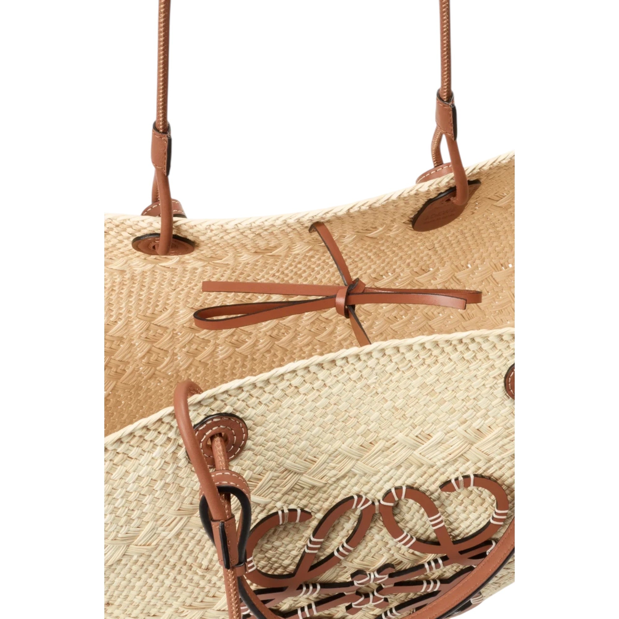 Via Manzoni Boutique large woven iraca palm basket bag with tan calfskin leather handles and tie closure