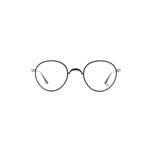 Via Manzoni Boutique Chrome Hearts SLOT ONE matte black titanium rounded eyeglasses with sterling silver temple details.