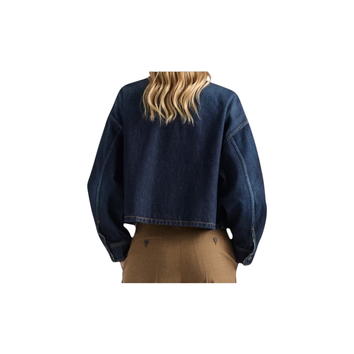 Back view of a woman wearing a Via Manzoni Boutique PRADA cropped dark indigo denim jacket with dropped shoulders.