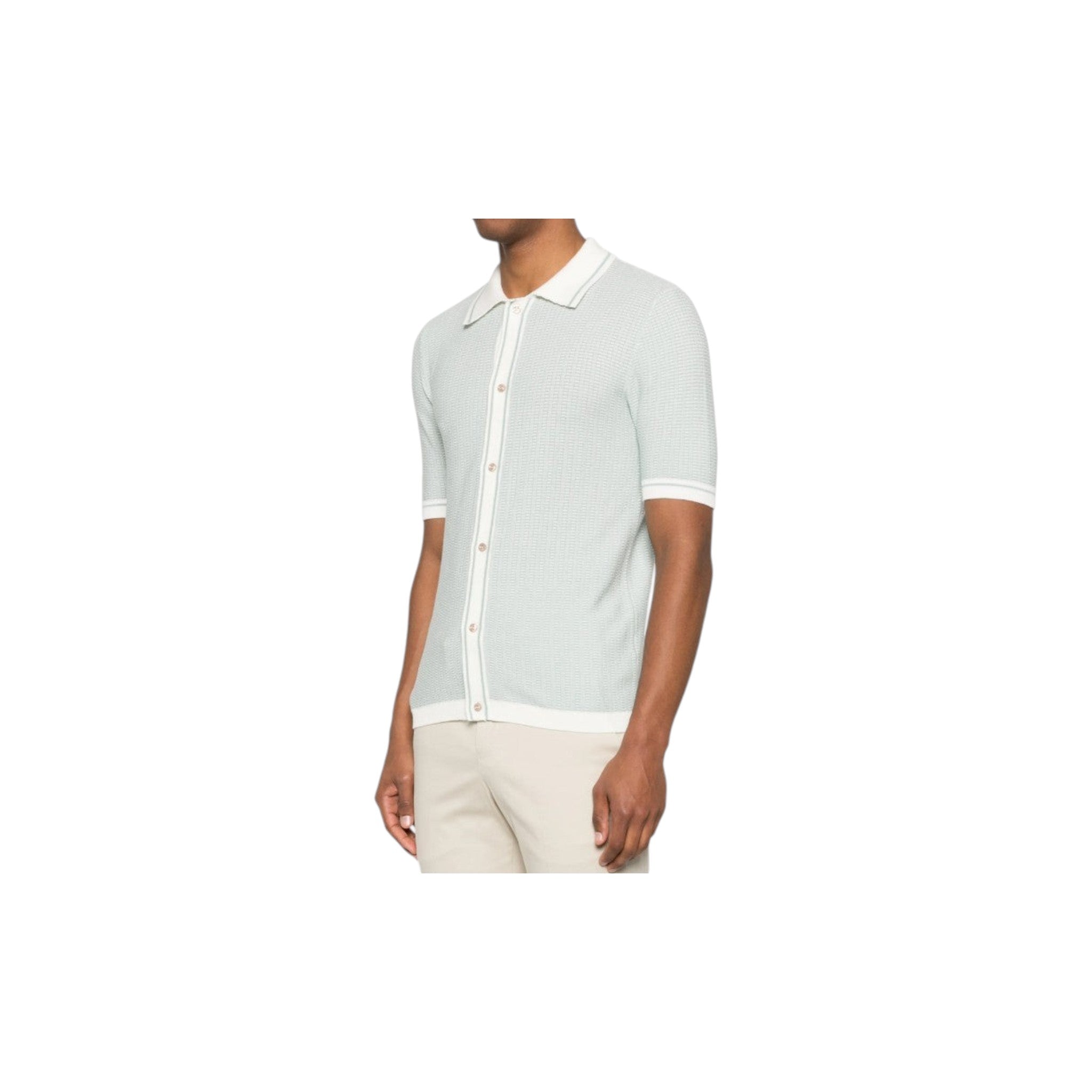 Via Manzoni Boutique sage green knit polo shirt with white collar, cuffs, and button placket on a male model.