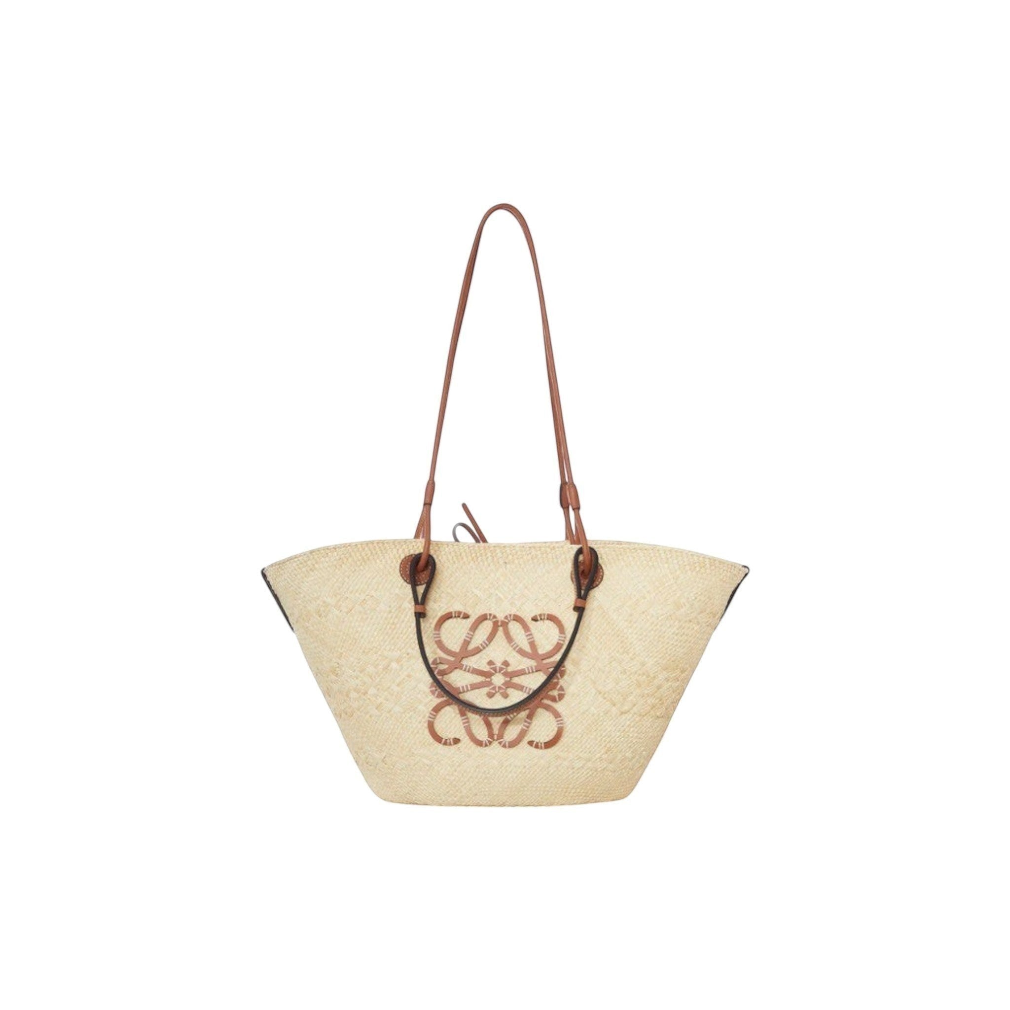 Via Manzoni Boutique natural raffia woven tote bag with tan leather straps and anagram logo detail.