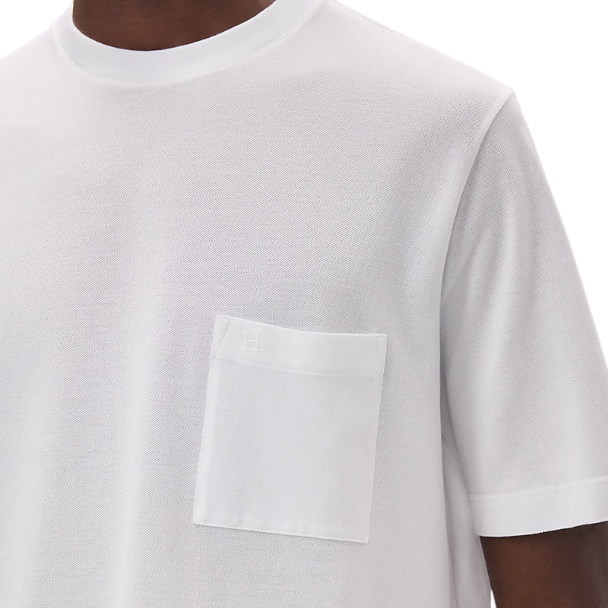Via Manzoni Boutique white cotton piqué T-shirt featuring a chest pocket with subtle tonal H embroidery