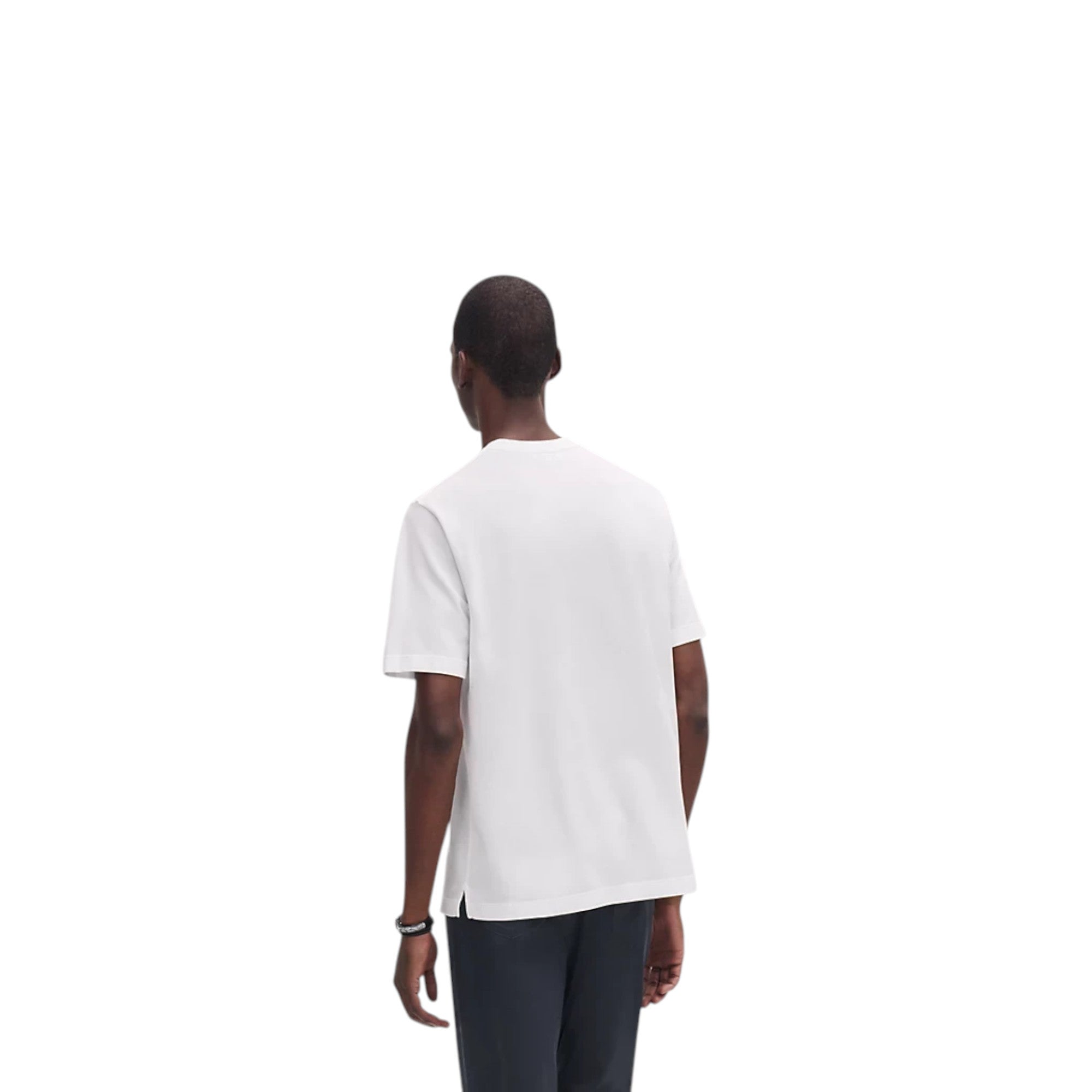 Via Manzoni Boutique white cotton piqué crewneck T-shirt with side hem slits worn by a model, back view