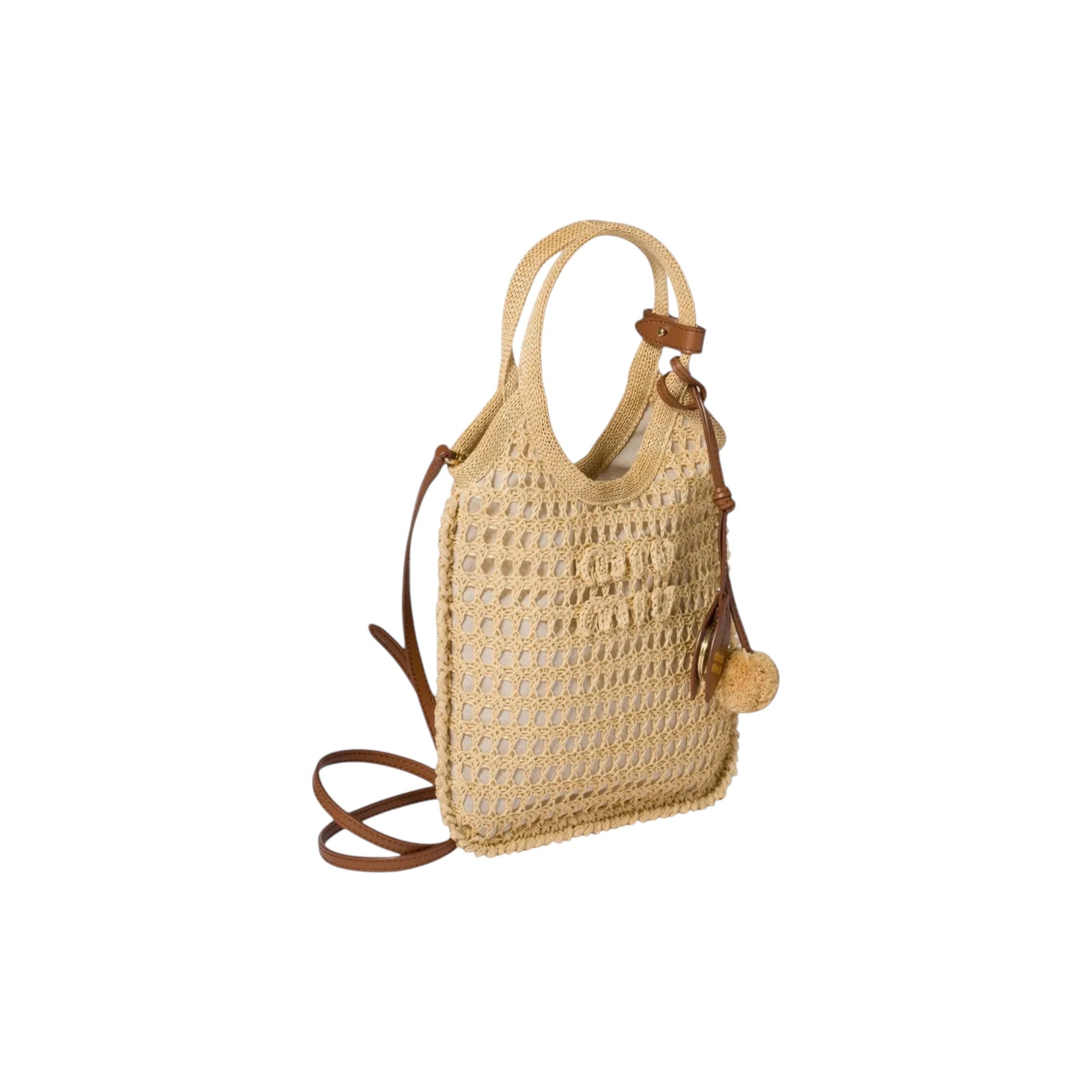 Via Manzoni Boutique Miu Miu Ivy beige raffia crochet tote bag with leather trim, pom-pom charm, and gold hardware.