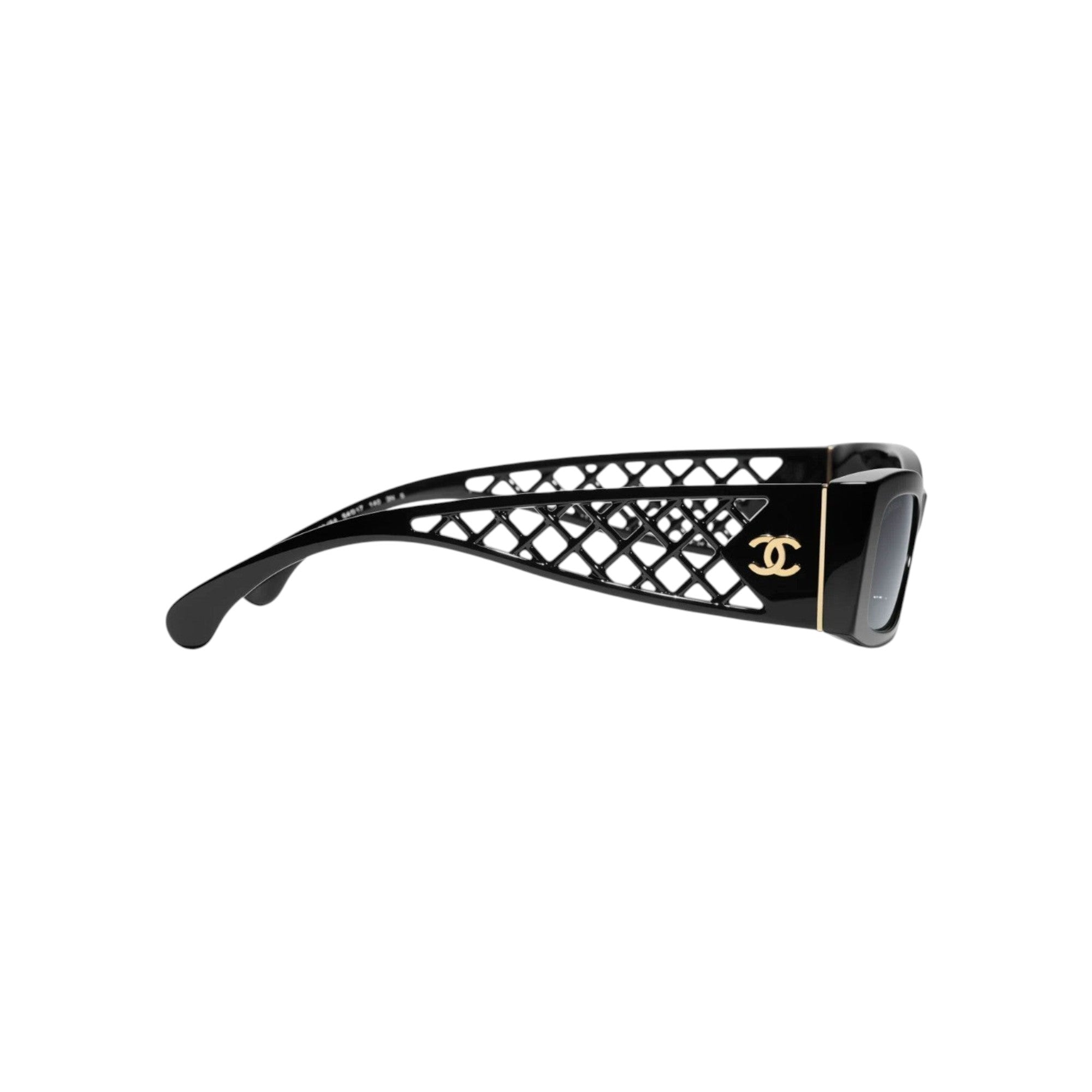 Via Manzoni Boutique black acetate rectangular sunglasses with lattice detail and gold Chanel logo.