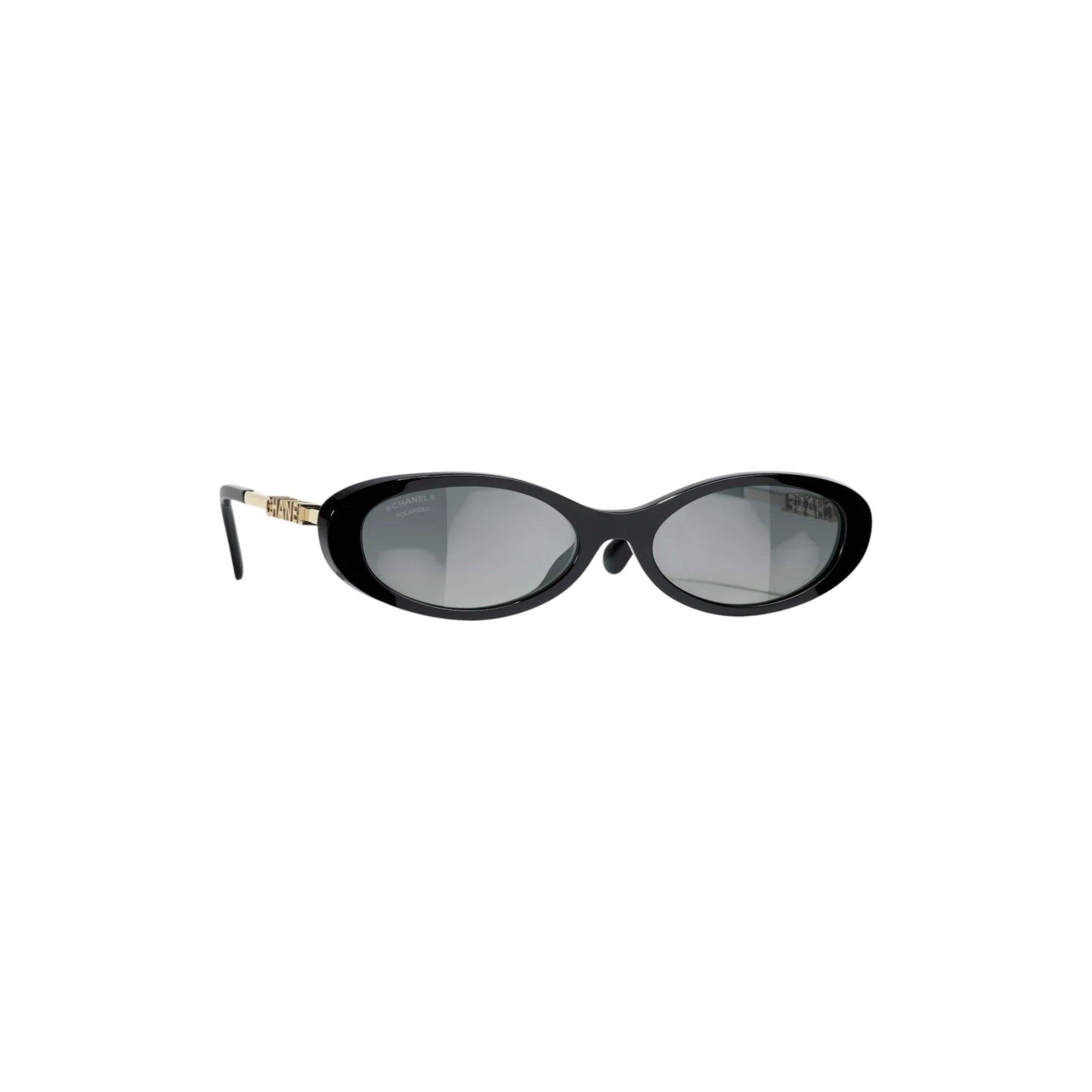 Via Manzoni Boutique Chanel oval sunglasses featuring a black acetate frame and gold-tone logo temples.