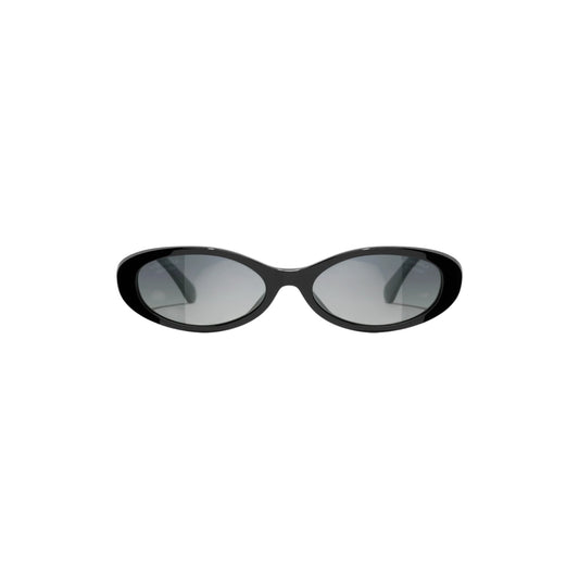Via Manzoni Boutique Chanel black acetate oval sunglasses with dark gray lenses and signature metal temples.