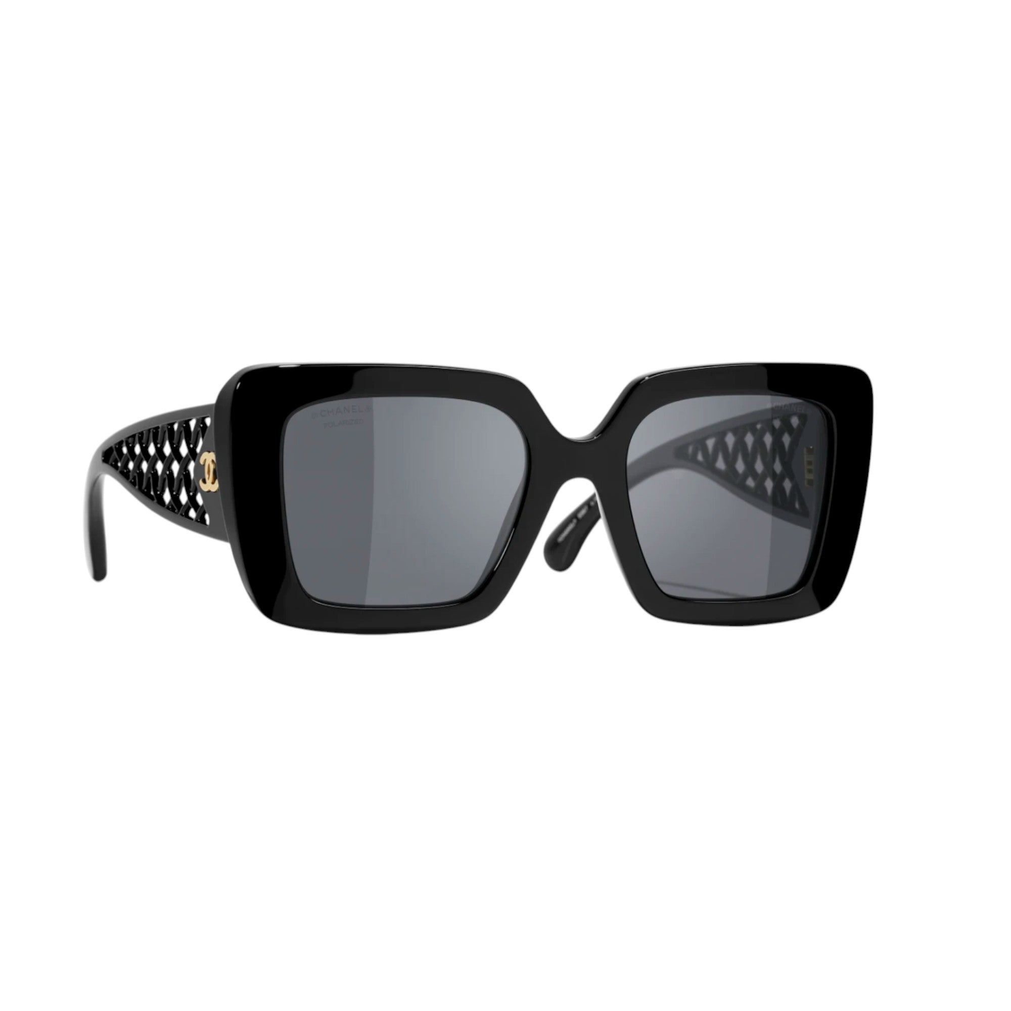 Black sunglasses with intricate design on a white background