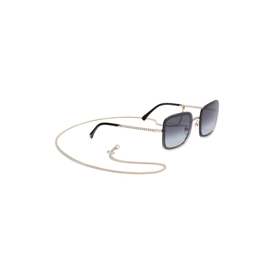 Via Manzoni Boutique Chanel CH4244 squarish sunglasses in gold metal with signature chain-link frame and gradient lenses