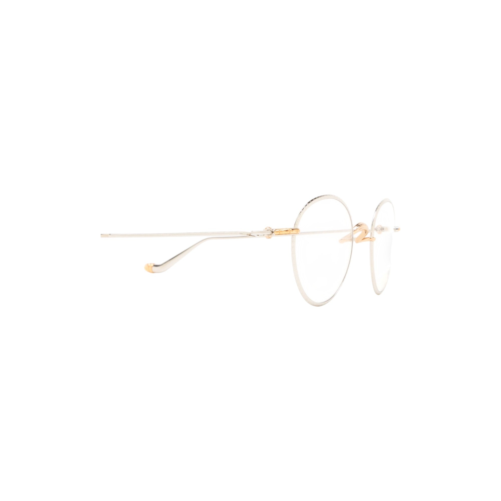 Via Manzoni Boutique Chrome Hearts SLOT ONE rounded titanium eyeglasses in silver with gold-plated sterling silver accents.