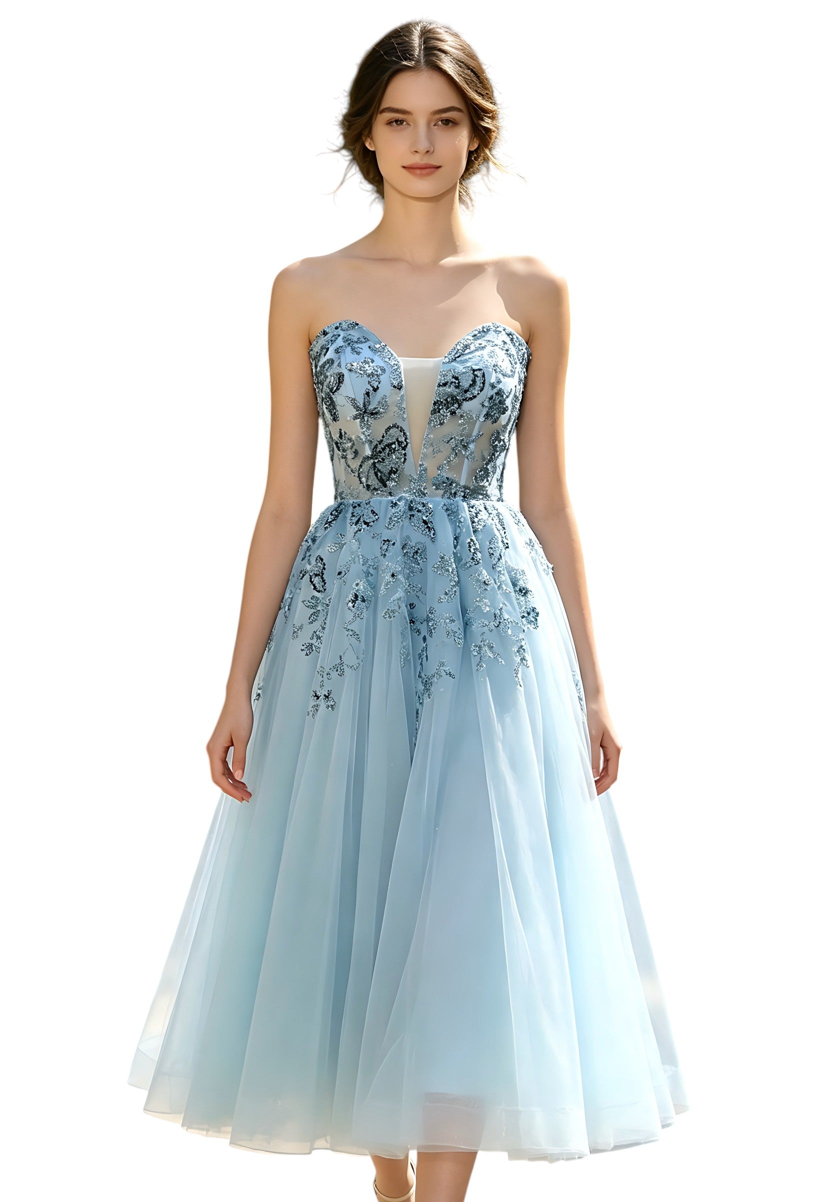 Via Manzoni Boutique dusty blue tulle prom dress with floral embroidery and sweetheart neckline. Features spaghetti straps and lace-up back.