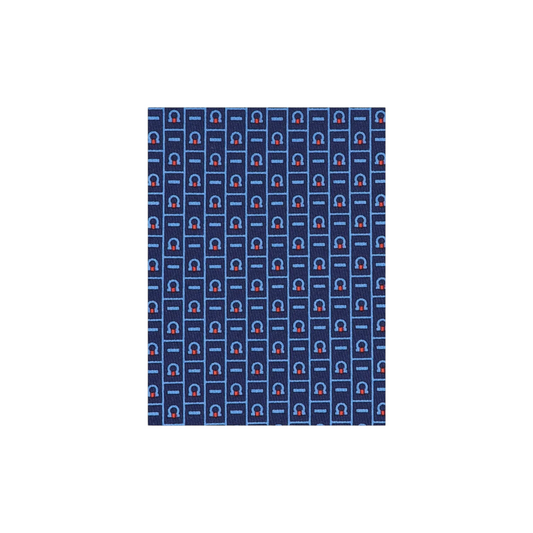 Via Manzoni Boutique Ferragamo silk necktie featuring a navy blue geometric pattern with light blue and red accents.
