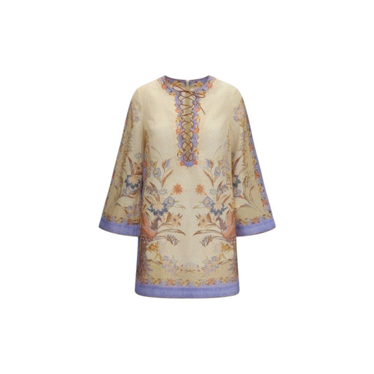 Via Manzoni Boutique floral print tunic dress with lace-up neckline, peacock motifs, and lavender accents.