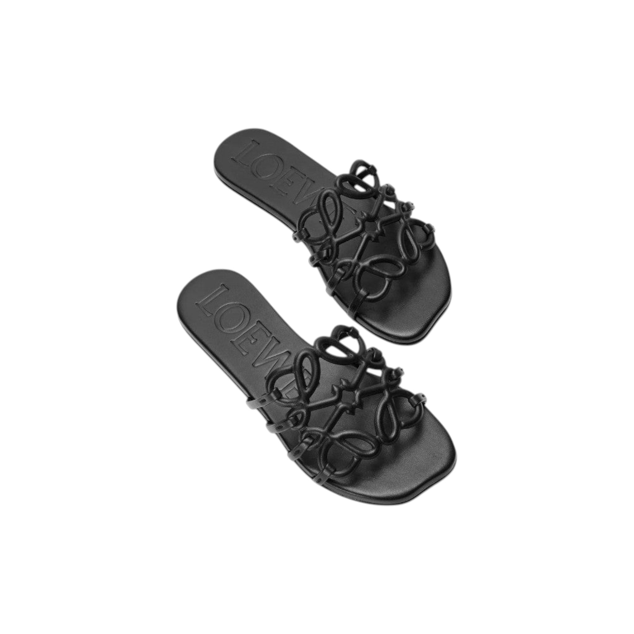 Via Manzoni Boutique black leather LOEWE slide sandals featuring an intricate knotted Anagram motif strap