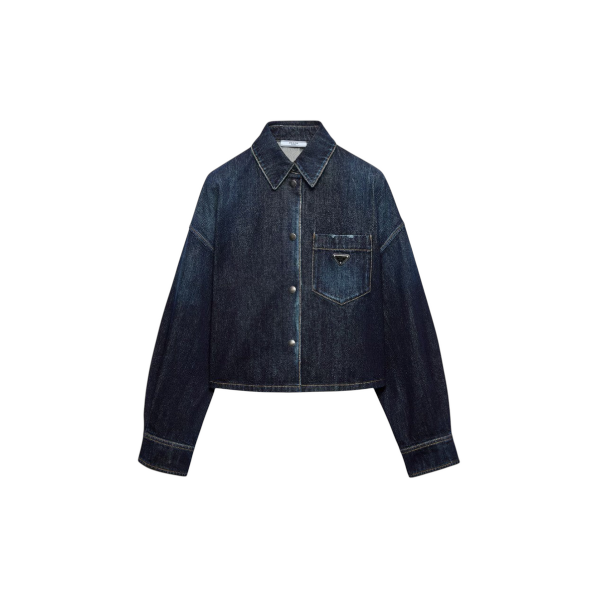 Via Manzoni Boutique PRADA cropped indigo denim jacket with a boxy fit, structured collar, and metal logo plaque.