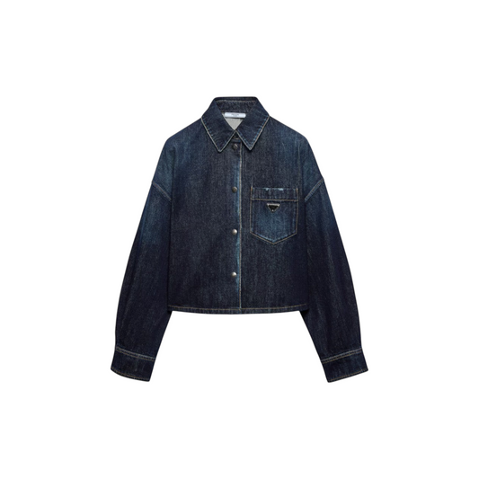 Via Manzoni Boutique PRADA cropped indigo denim jacket with a boxy fit, structured collar, and metal logo plaque.