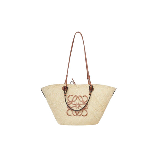 Via Manzoni Boutique natural raffia woven tote bag with tan leather straps and anagram logo detail.
