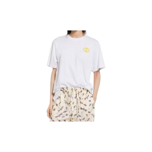 Via Manzoni Boutique white cotton t-shirt with embroidered yellow GG logo on chest. Crew neck, short sleeves, relaxed fit.