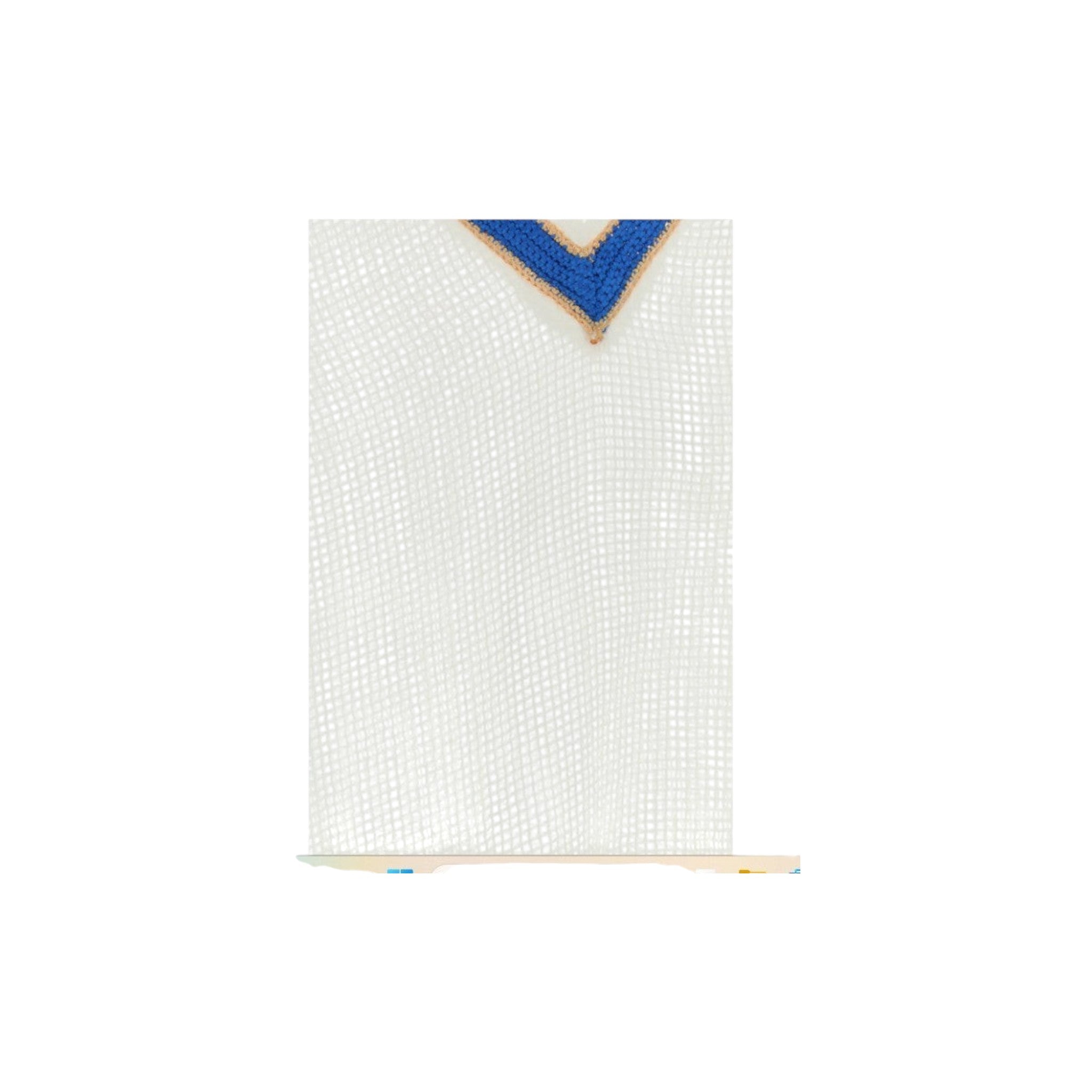 Via Manzoni Boutique white crochet beach cover-up with a blue V-neckline and open-weave fabric detail.
